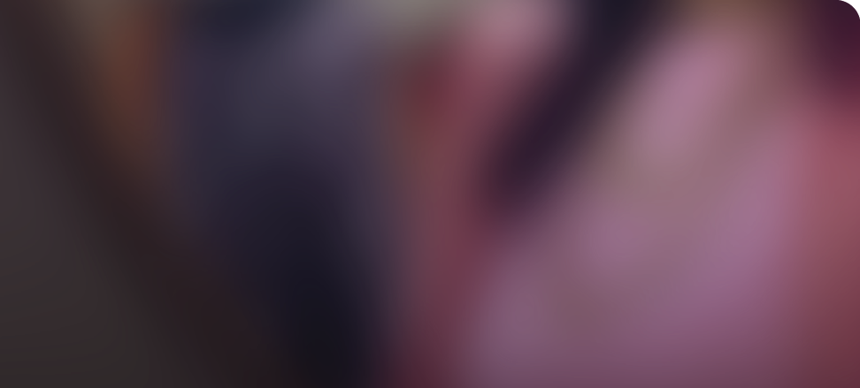 A woman is standing in front of a mirror, wearing a pink shirt. AI generated content