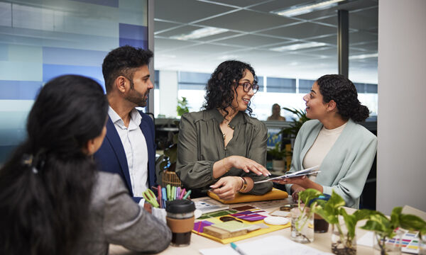 Four people in discussion
