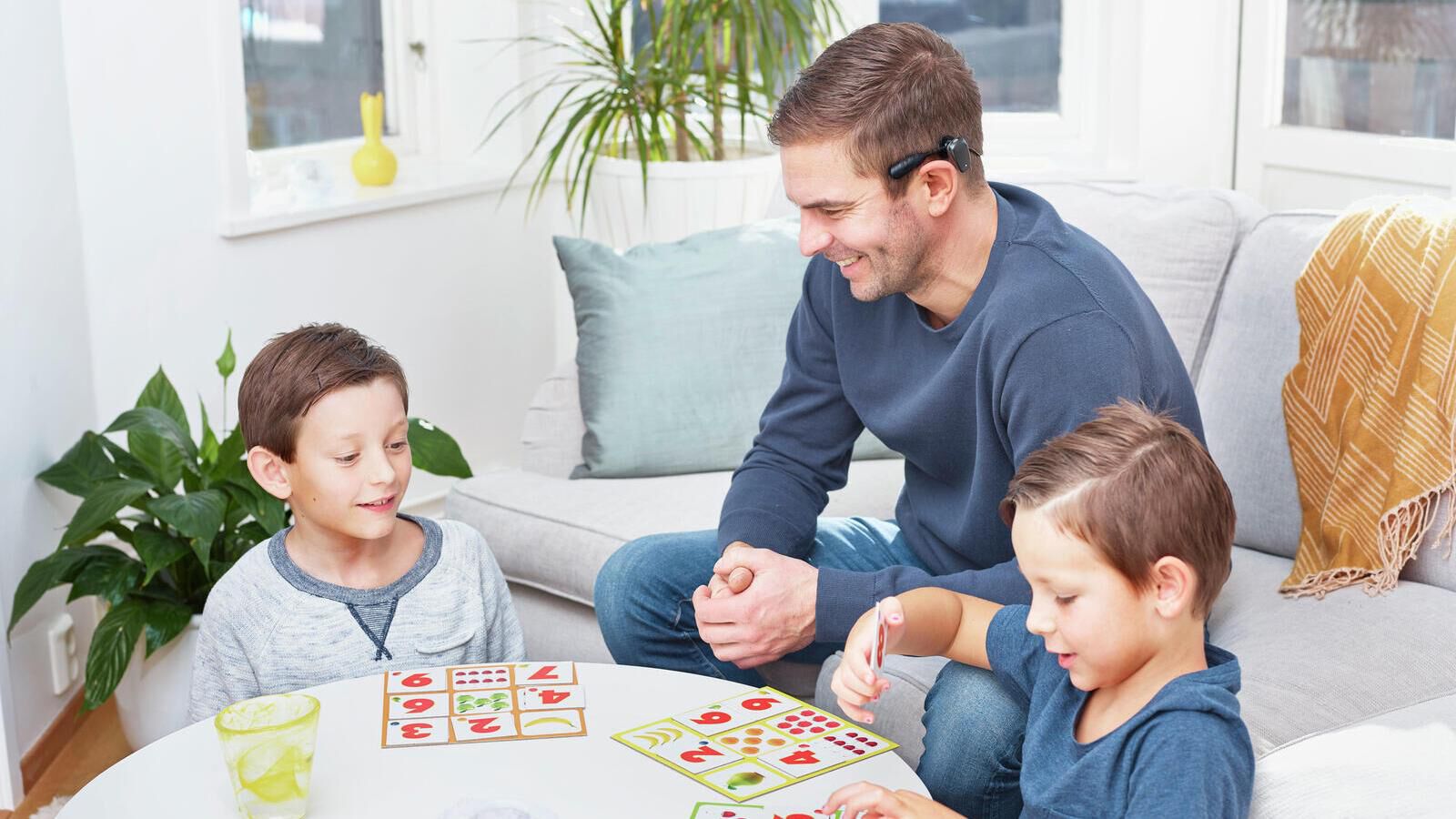 Man playing with children