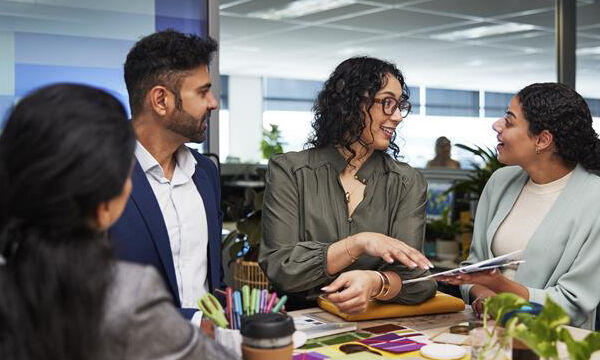 Three people in discussion