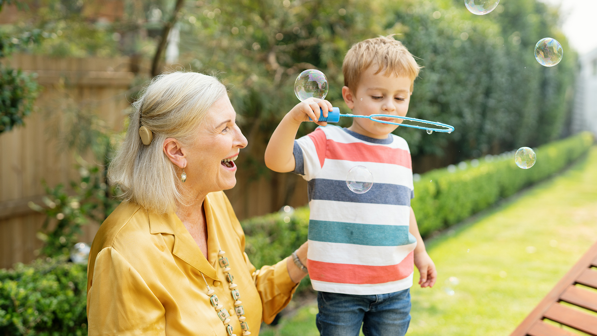 Play video about Grandmother playing with the grandson